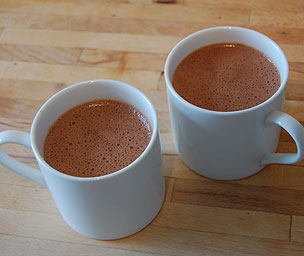 Two mugs of hot chocolate